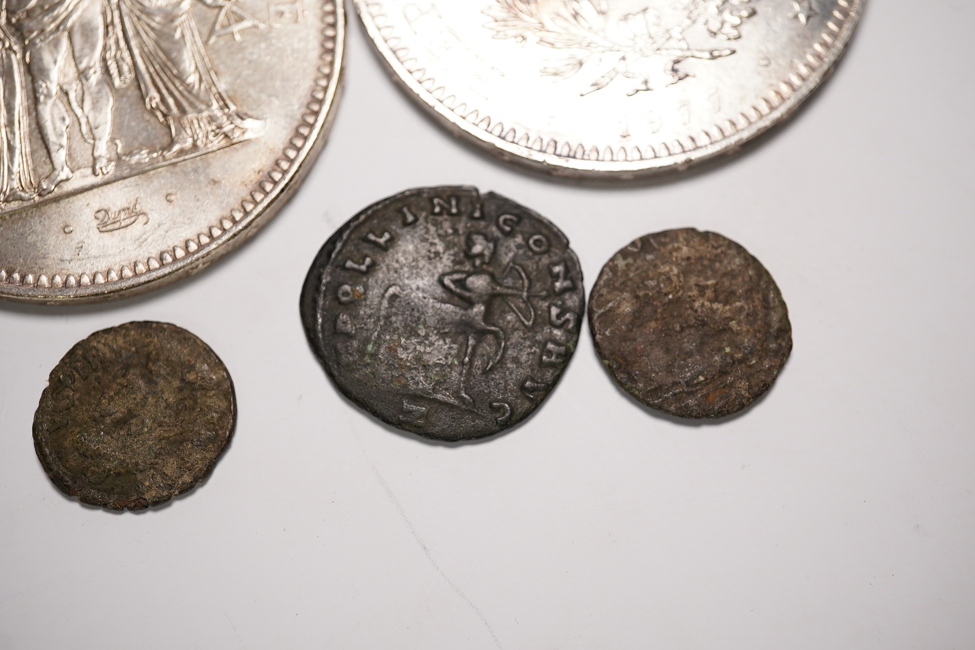 Two fifty Franc silver coins and four Roman AE coins. Condition - as per images